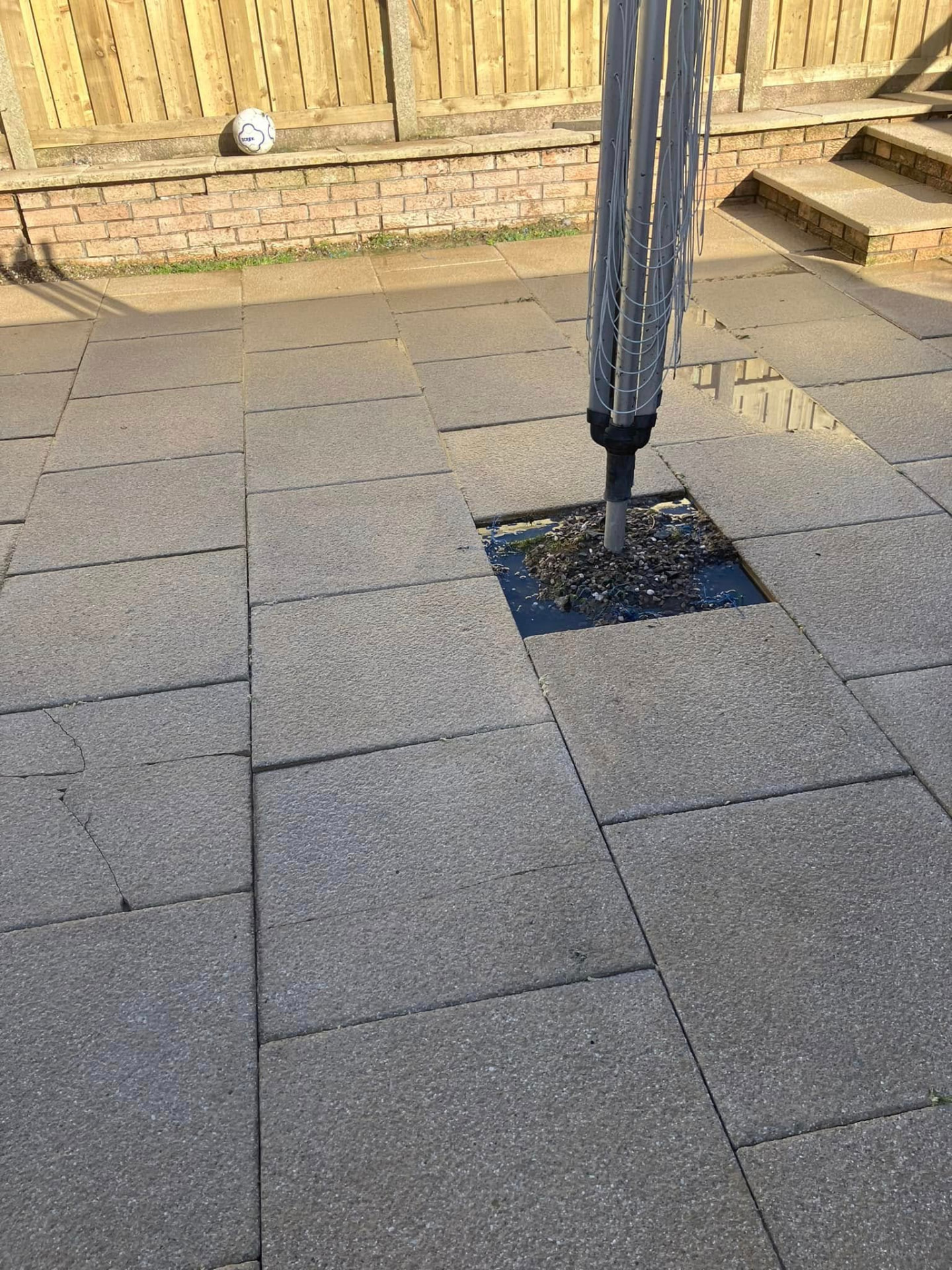Same patio paving slabs after pressure jetting